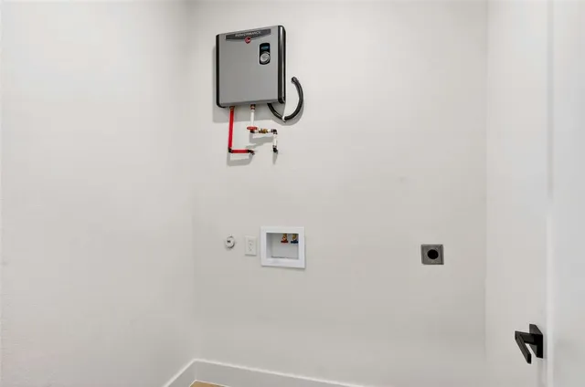 a bathroom with a shower and mirror