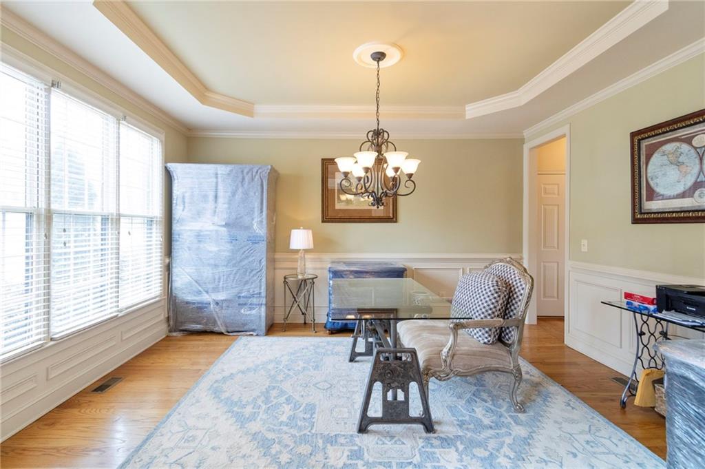 202 Davis Mill Road Ball Ground, GA 30107 - Photo 2 of 21 a view of a dining room with furniture window and outside view