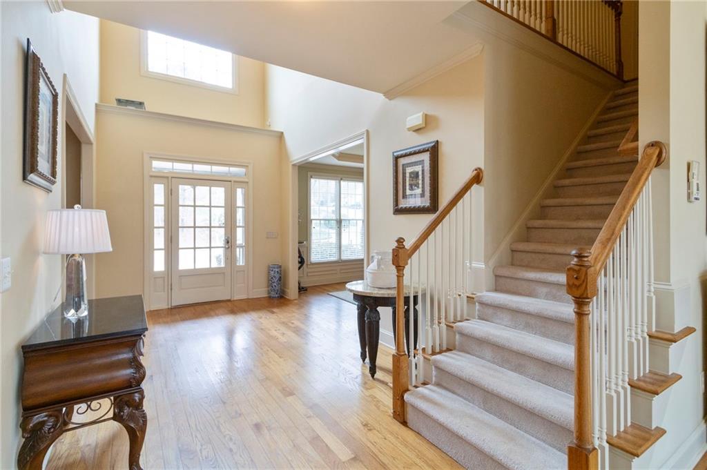 202 Davis Mill Road Ball Ground, GA 30107 - Photo 3 of 21 a view of entryway and hall with wooden floor