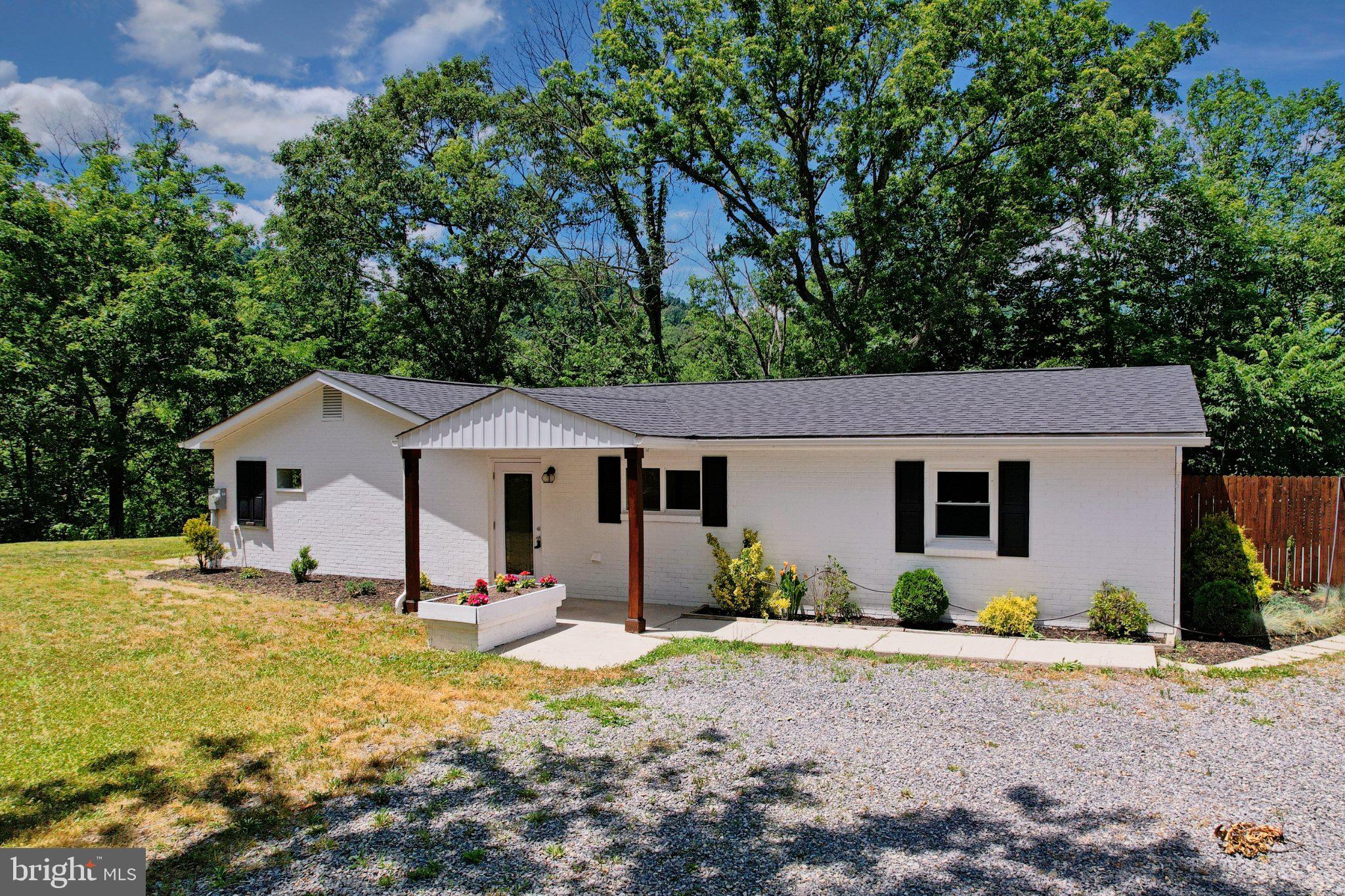 125 Ashland Drive Ridgeley, WV 26753 - Photo 1 of 41 Charming home nestled in nature's embrace.