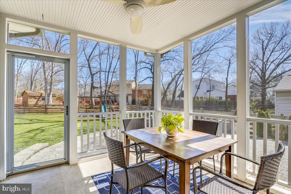 3005 Farm Road Alexandria, VA 22302 - Photo 14 of 59 a view of a dining room with furniture window and outside view