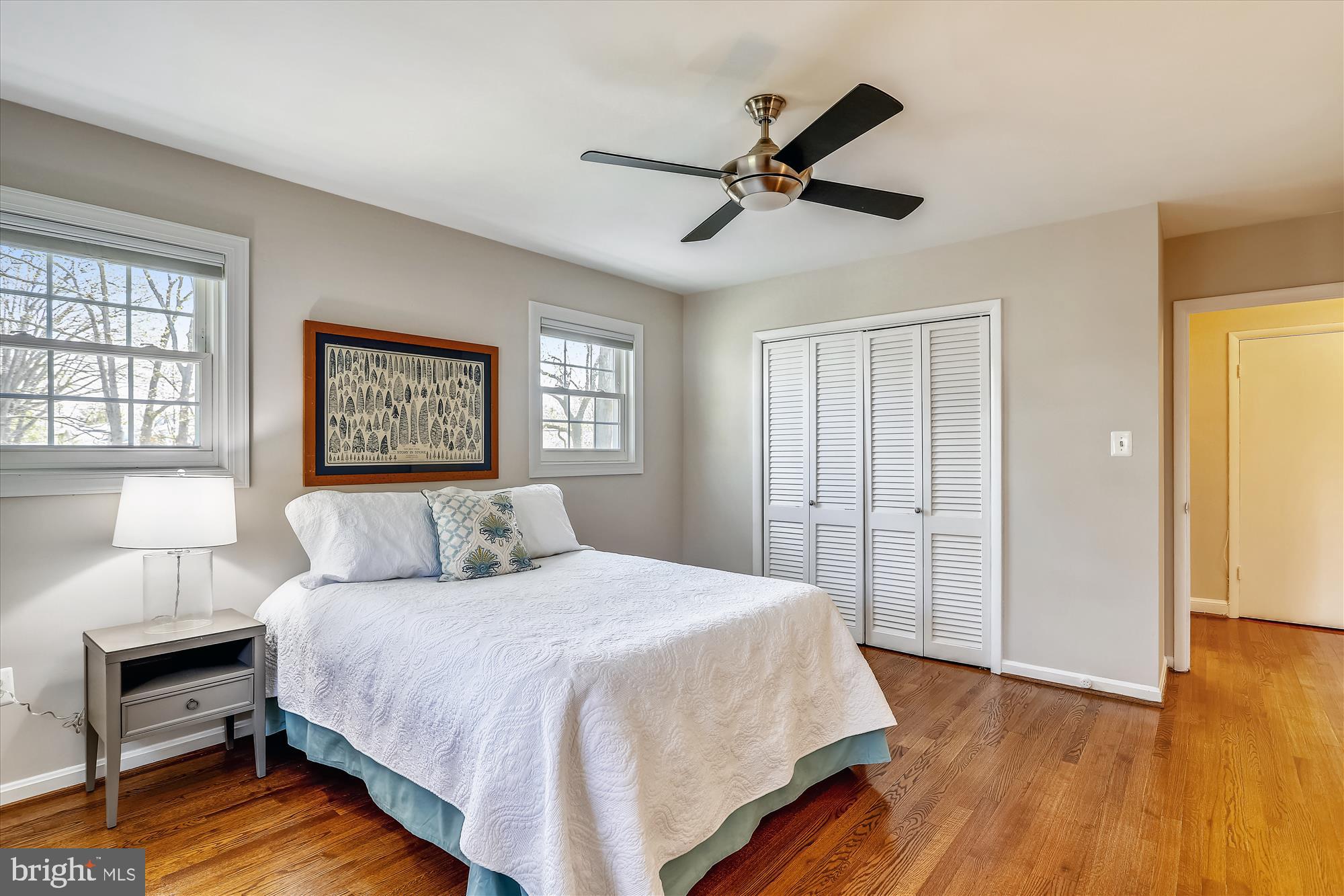 3005 Farm Road Alexandria, VA 22302 - Photo 33 of 59 a bedroom with a large bed and a chandelier