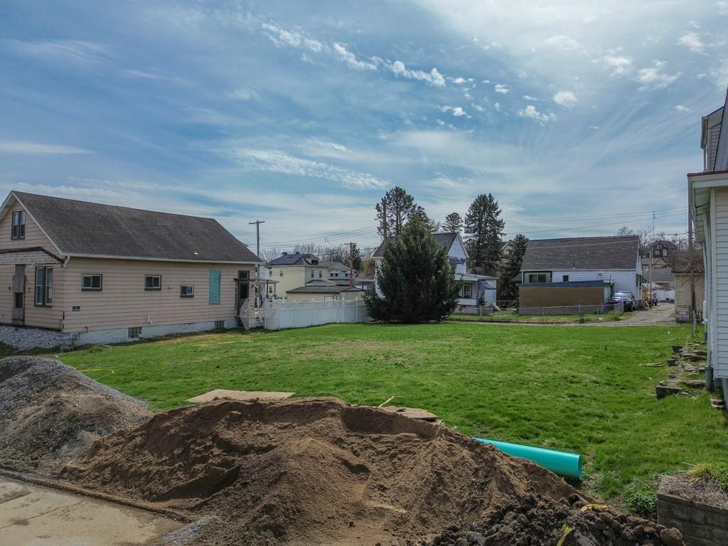0 Russellwood Avenue McKees Rocks, PA 15136 - Photo 4 of 5 a view of a house with backyard and garden