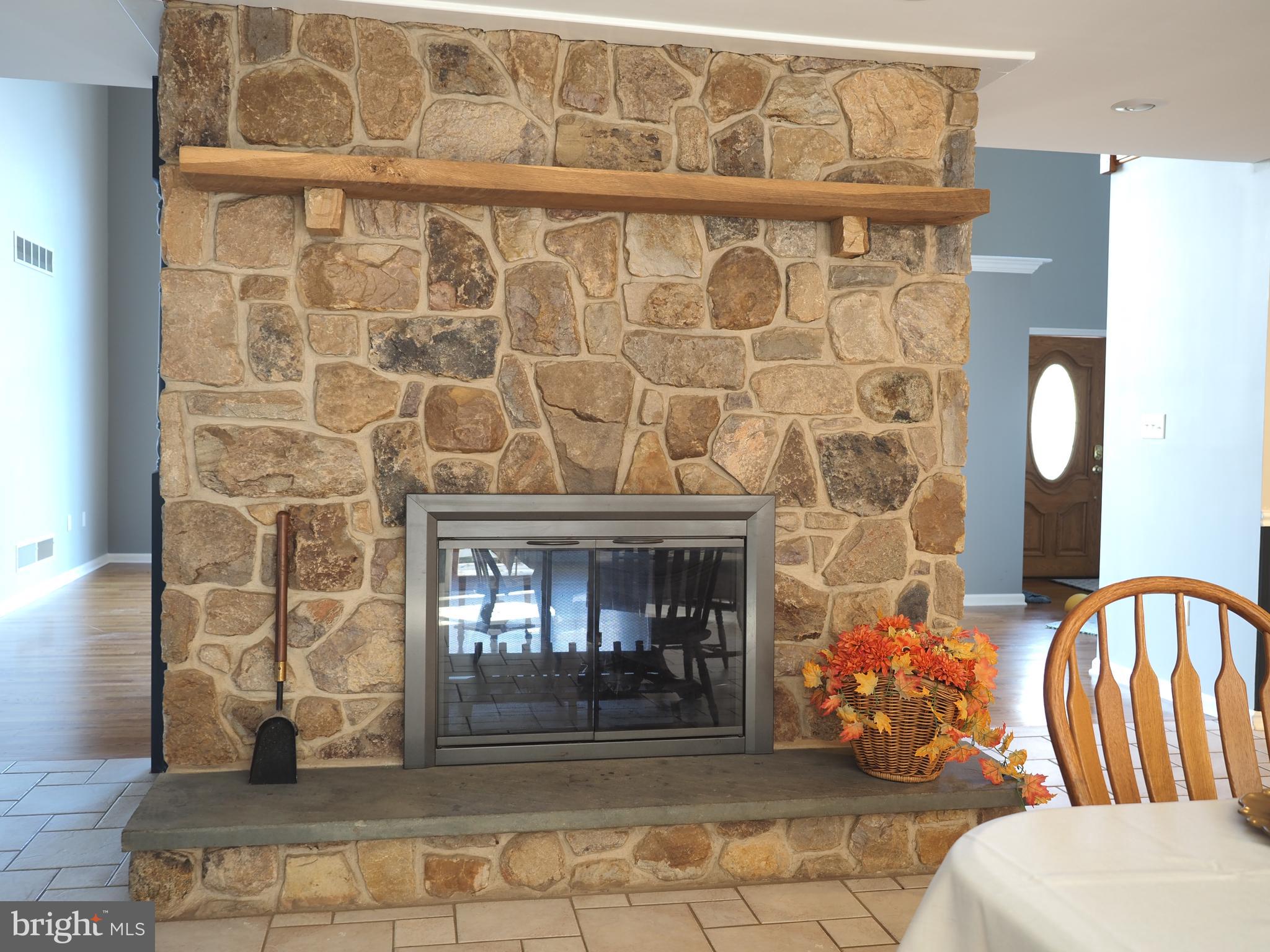 135 Watson Mill Road Landenberg, PA 19350 - Photo 11 of 56 Double sided fireplace-kitchen side