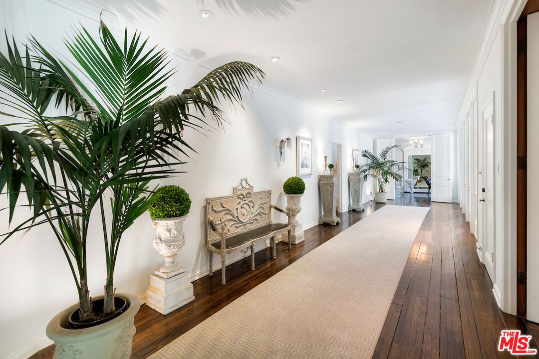 601 Woodruff Avenue Los Angeles, CA 90024 - Photo 15 of 39 a view of entryway and hall with wooden floor