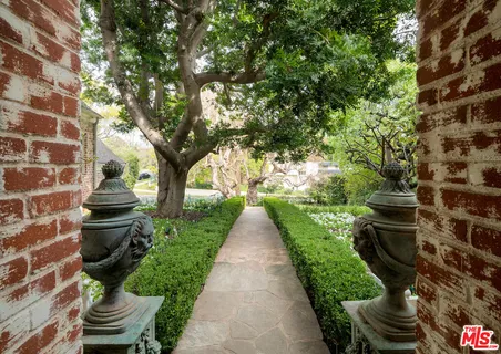 a view of kitchen with furniture and wooden floor