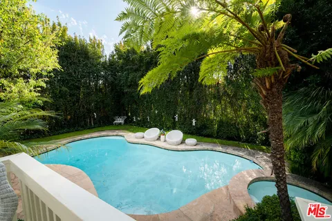 a view of a outdoor space and swimming pool