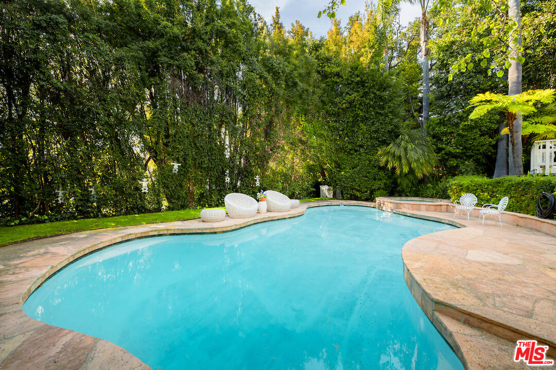 601 Woodruff Avenue Los Angeles, CA 90024 - Photo 35 of 39 a view of a outdoor space and swimming pool