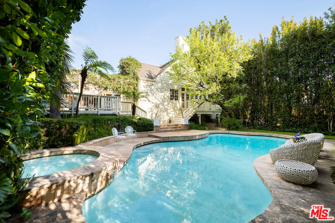 601 Woodruff Avenue Los Angeles, CA 90024 - Photo 38 of 39 a view of a house with swimming pool