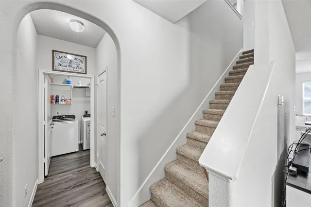 a utility room with dryer and washer