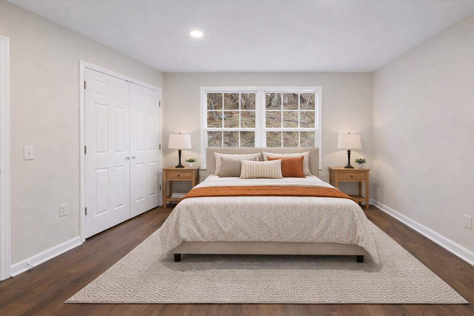 138 Pierce Avenue Pulaski, VA 24301 - Photo 25 of 40 a bedroom with a bed and wooden floor