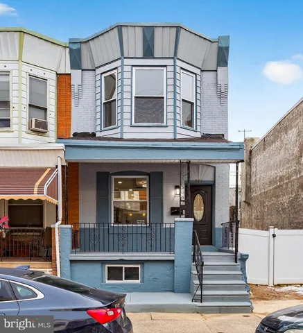 a front view of a house with a front door