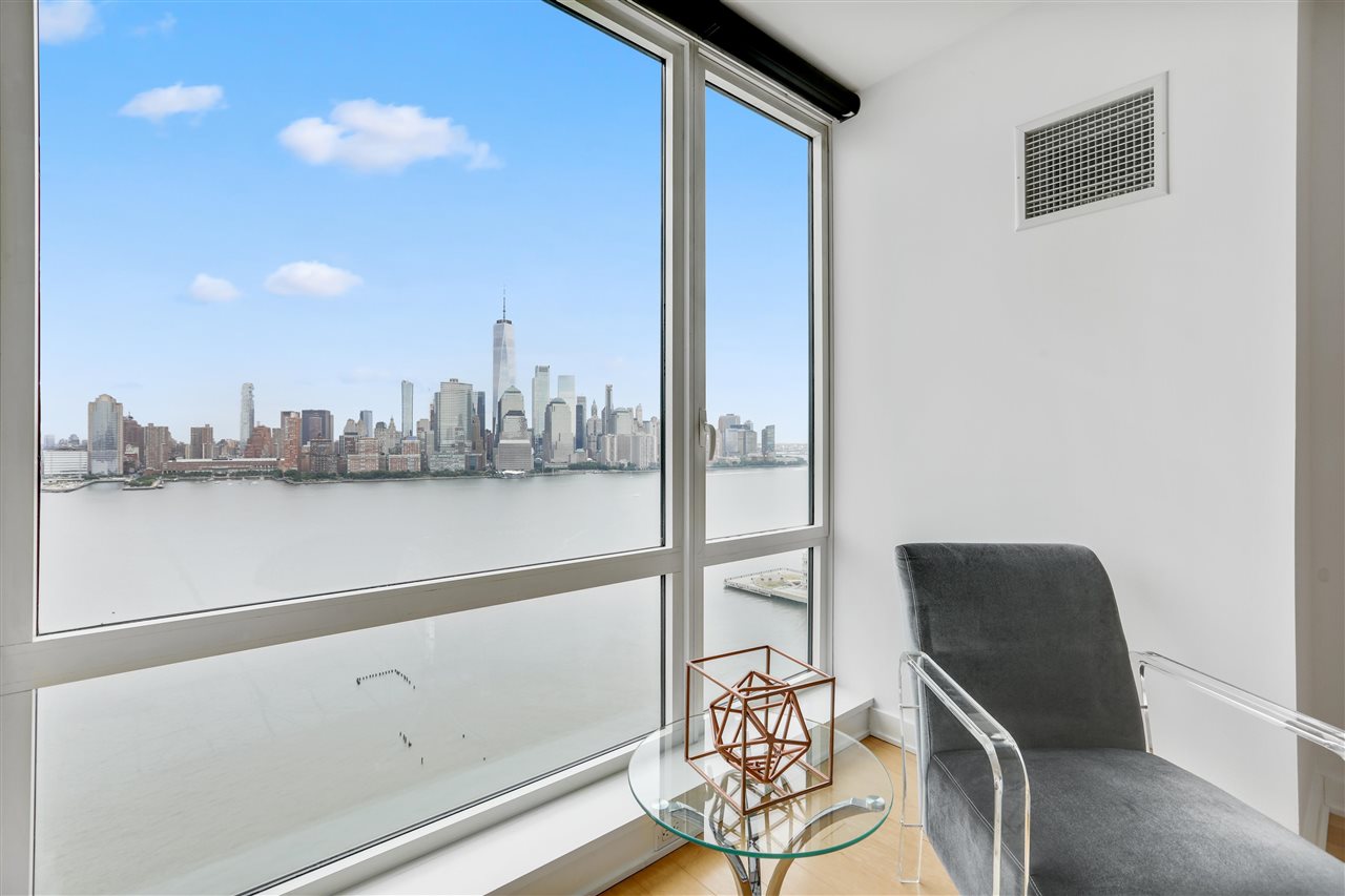 2 2nd Street, Unit 2803 Jersey City, NJ 07302 - Photo 5 of 28 a view of roof deck with furniture