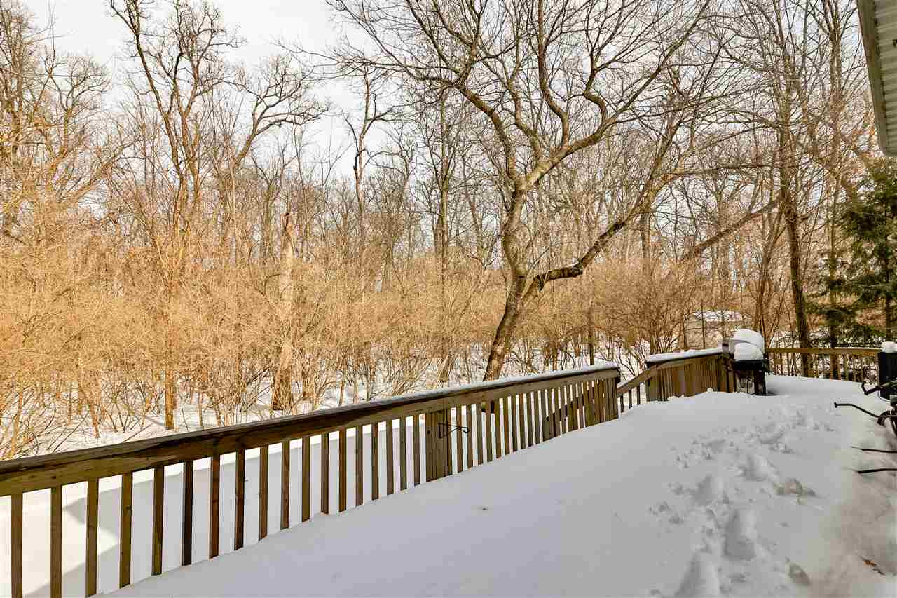 312 Rochester Road Northeast Poplar Grove, IL 61065 - Photo 28 of 28 a balcony with view of trees