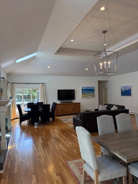 3 Stone Lane Quogue, NY 11959 - Photo 16 of 35 a living room with furniture and a flat screen tv