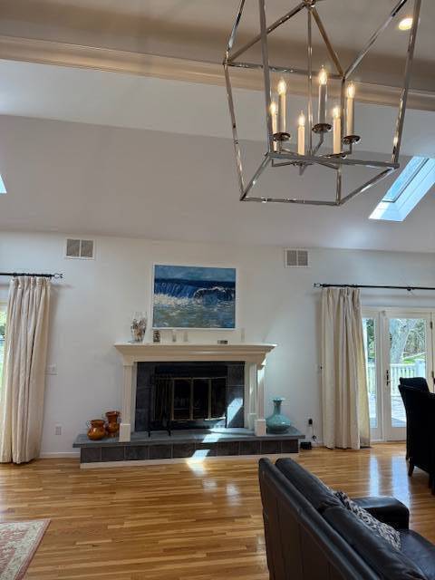 3 Stone Lane Quogue, NY 11959 - Photo 23 of 35 a living room with stainless steel appliances granite countertop furniture and a fireplace