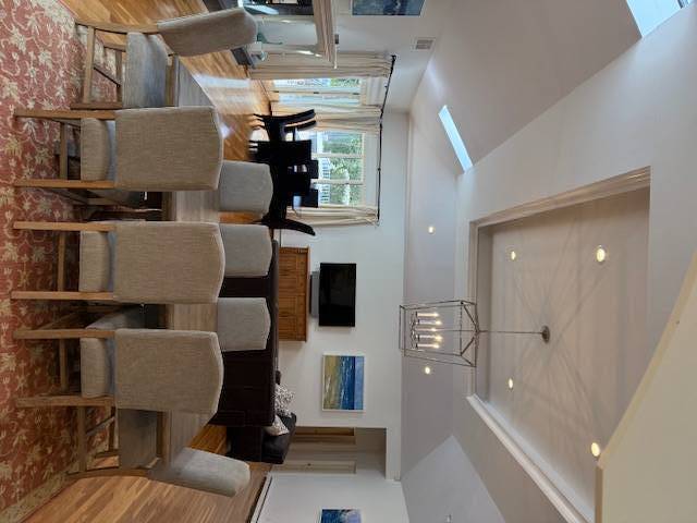 3 Stone Lane Quogue, NY 11959 - Photo 24 of 35 a living room with furniture and a window