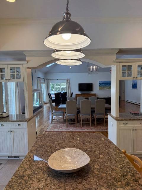3 Stone Lane Quogue, NY 11959 - Photo 34 of 35 a room with lots of tables a mirror and furniture