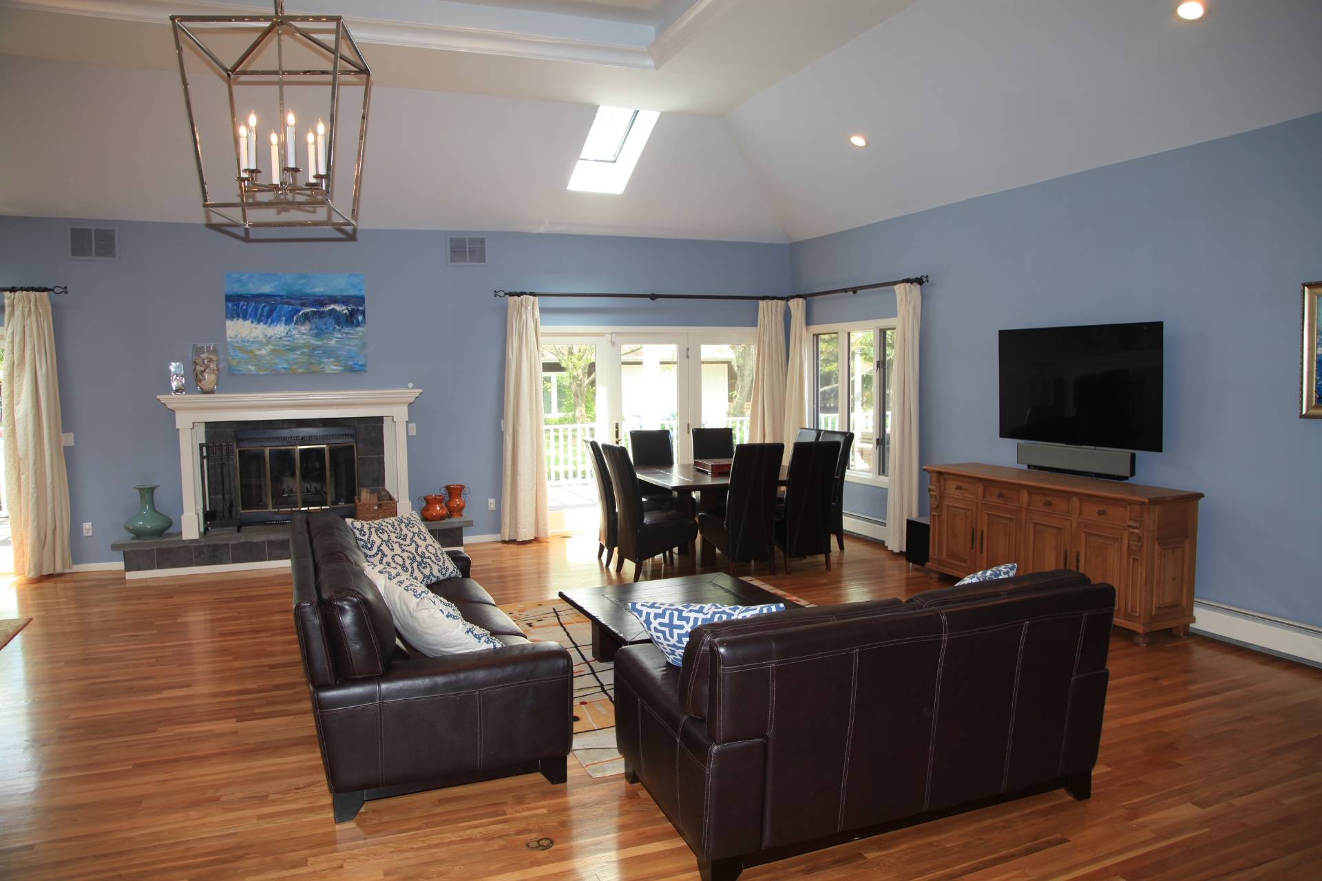 3 Stone Lane Quogue, NY 11959 - Photo 9 of 35 a living room with furniture and a flat screen tv