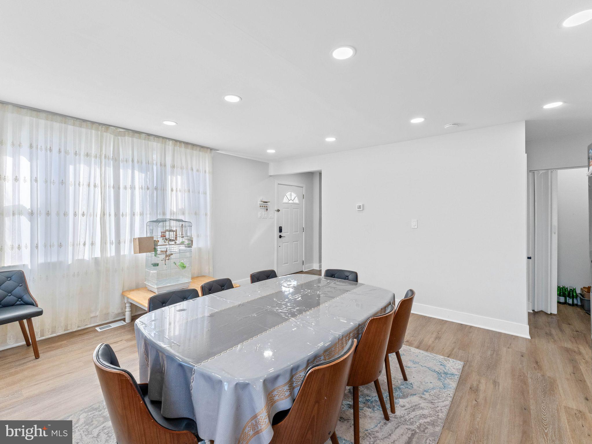 1152 Morefield Road Philadelphia, PA 19115 - Photo 4 of 29 a view of a a dining room with furniture window and wooden floor