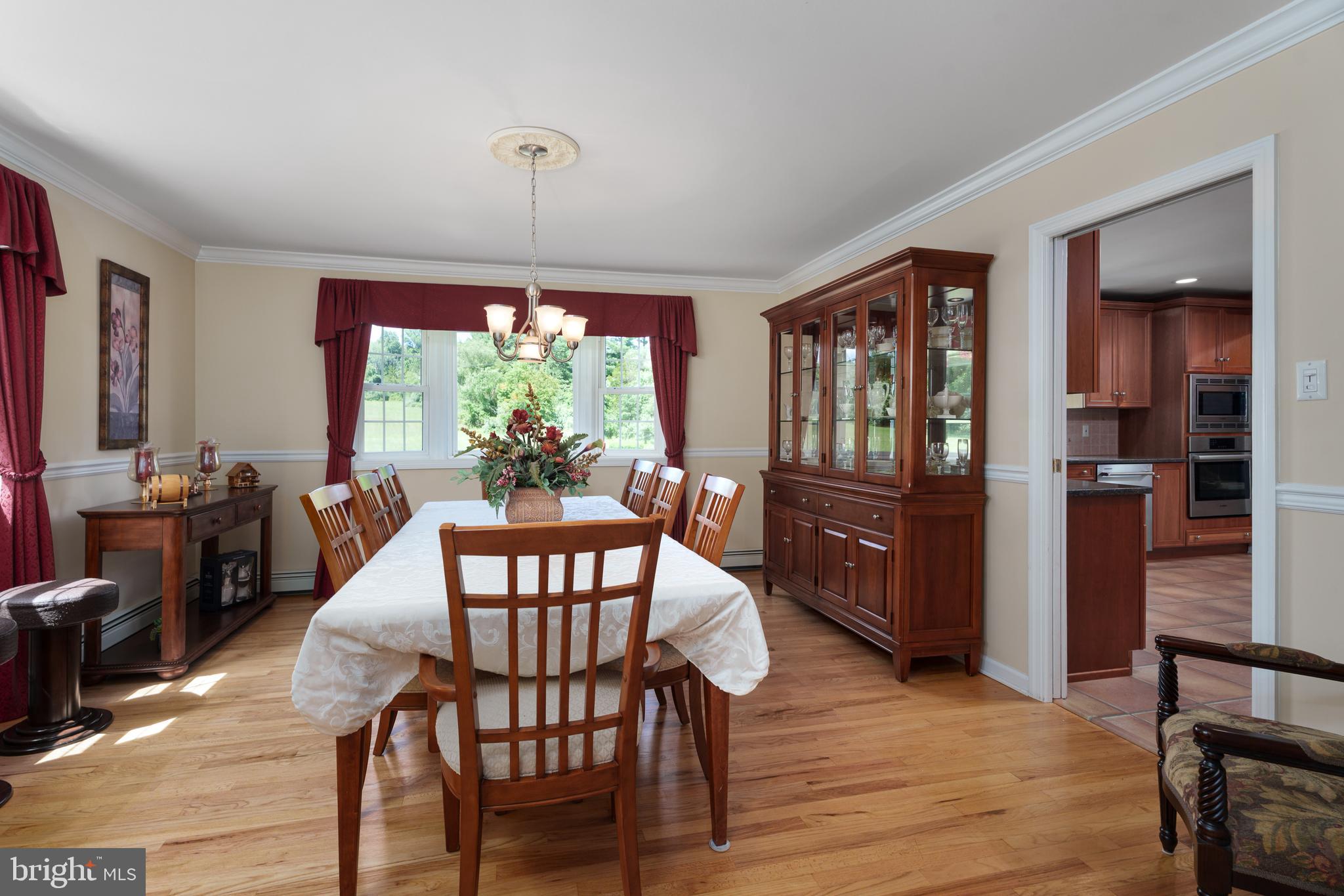 56 Valley Road Lambertville, NJ 08530 - Photo 23 of 49 a view of a dining room with furniture window and wooden floor