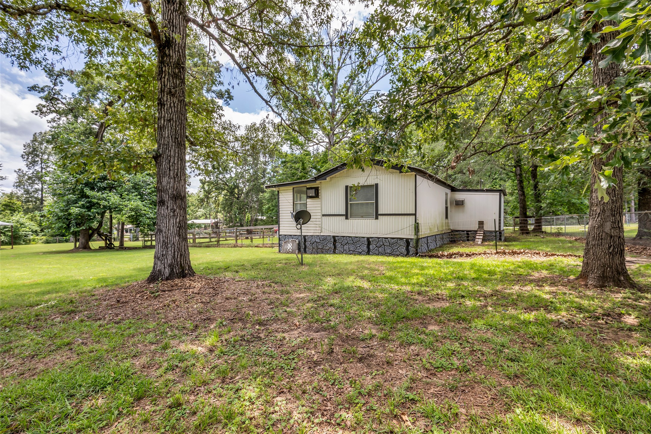 188 Chrissy Lane Trinity, TX 75862 - Photo 17 of 25 a house view with a backyard space