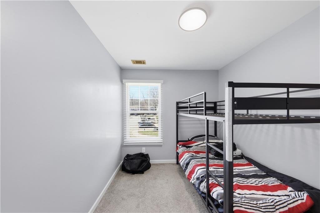 2166 Braxton Road Southwest Atlanta, GA 30331 - Photo 12 of 19 a view of a room with gym equipment