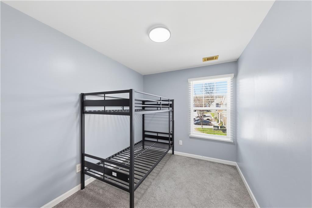 2166 Braxton Road Southwest Atlanta, GA 30331 - Photo 10 of 19 a view of an empty room with a window