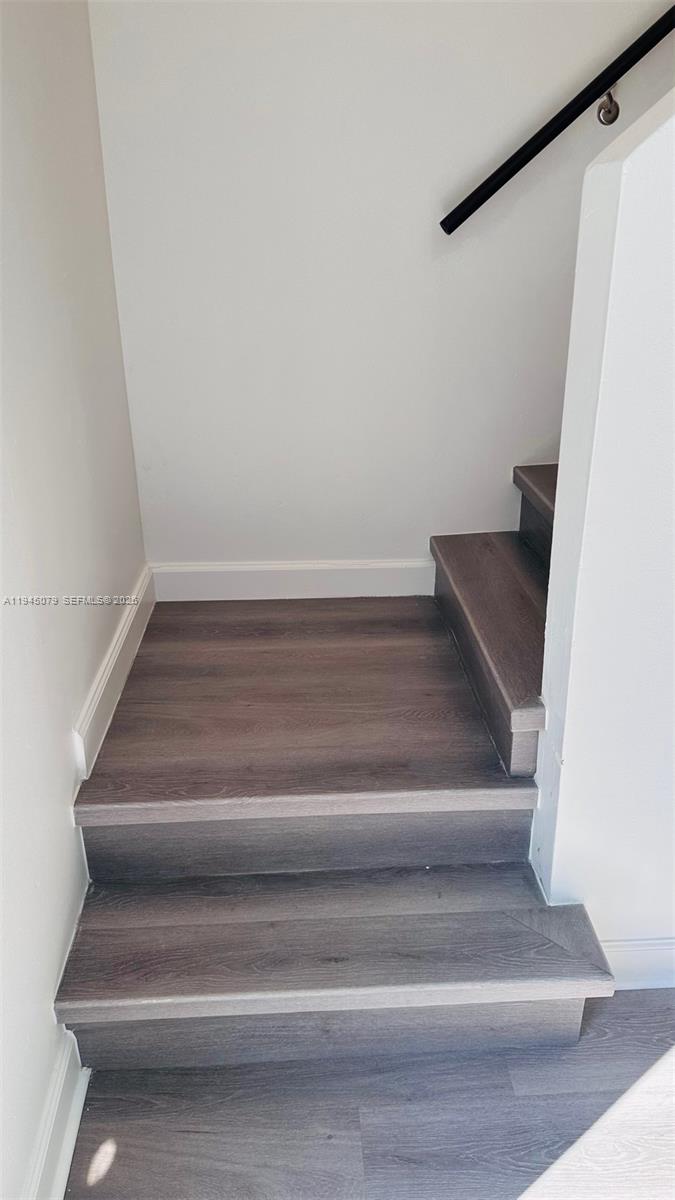 8240 Southwest 149th Court, Unit 7205 Miami, FL 33193 - Photo 10 of 14 a close view of staircase