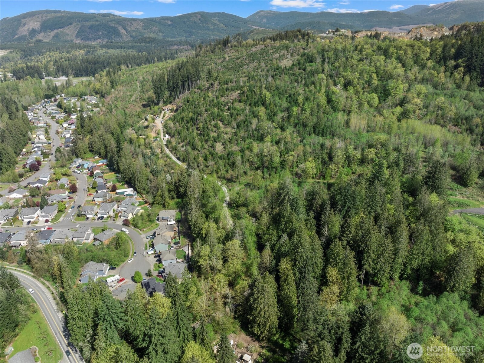 -xx Menzel Lake Road Granite Falls, WA 98252 - Photo 16 of 31 a view of a lush green forest with trees and some houses