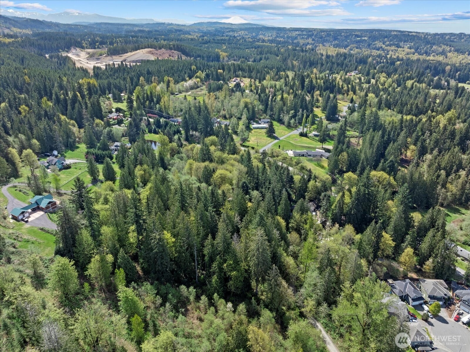 -xx Menzel Lake Road Granite Falls, WA 98252 - Photo 21 of 31 an aerial view of a houses with a lush green hillside
