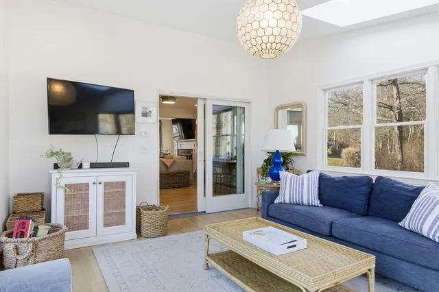 a bathroom with a toilet a sink and a mirror