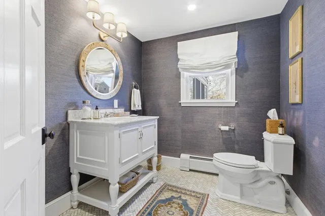 a view of a livingroom with furniture and window