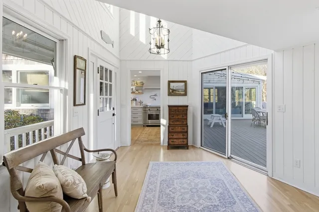 a bedroom with a bed and a table in it