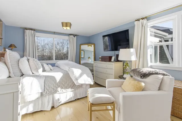 a bedroom with a couch and a couch