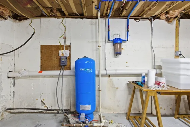 a view of a chairs and table on the wooden floor