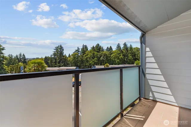 a view of a balcony with an outdoor space