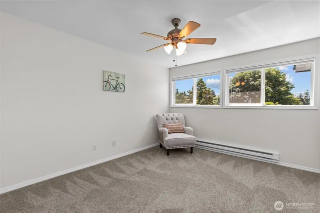 a view of livingroom with furniture and window