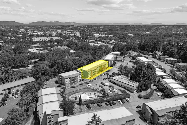 an aerial view of a city with lots of residential buildings