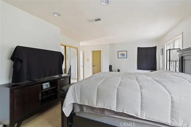 a bathroom with 2 sink and a mirror