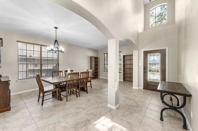 a view of a dining room with furniture