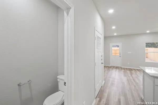 a bathroom with a sink and toilet