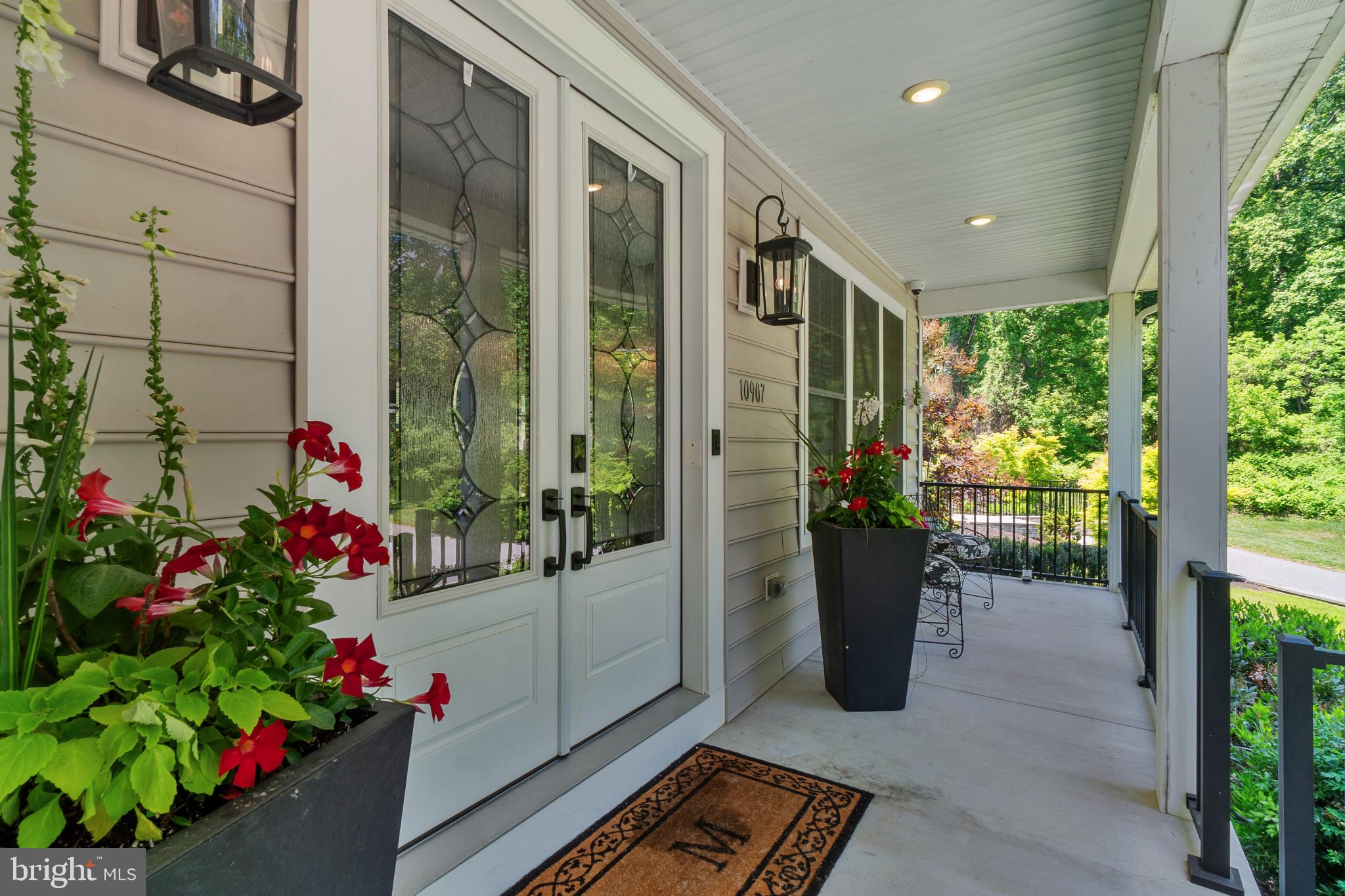 10907 Hollow Road Cockeysville, MD 21030 - Photo 3 of 57 a very nice looking room with a large window and flowers