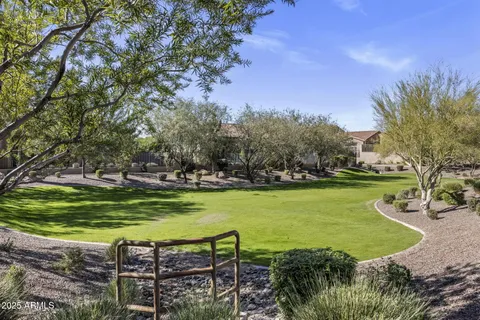 a view of a lake with a yard