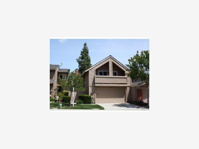 a picture of a house with a yard