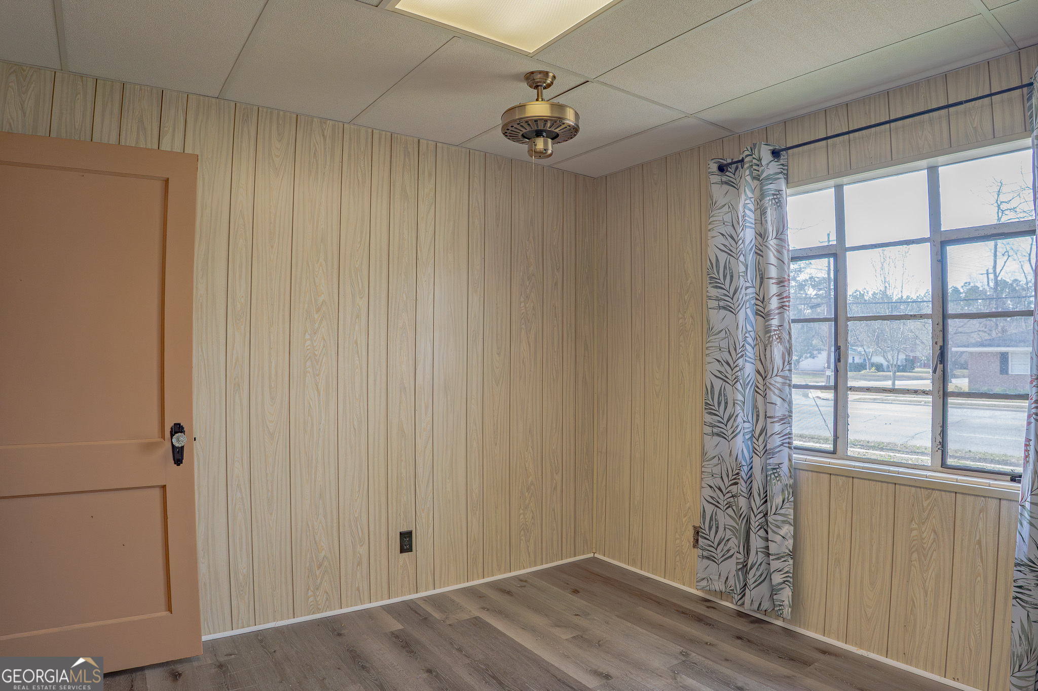 1615 Brunel Street Waycross, GA 31501 - Photo 15 of 28 a view of an empty room with a window