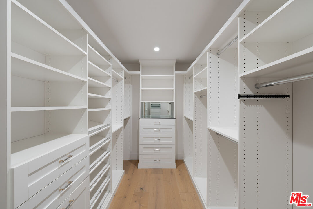 9645 Highridge Drive Beverly Hills, CA 90210 - Photo 18 of 29 a view of walk in closet