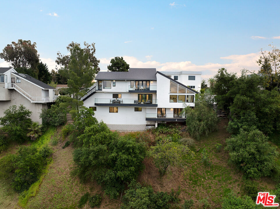 9645 Highridge Drive Beverly Hills, CA 90210 - Photo 28 of 29 a house view with a outdoor space