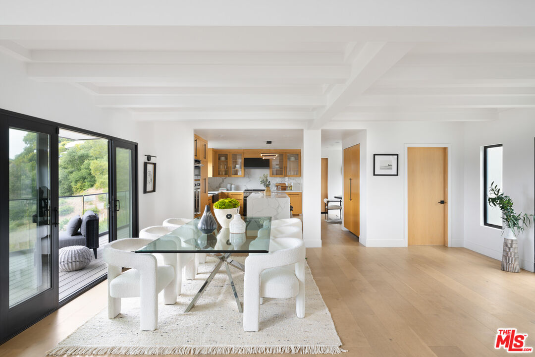 9645 Highridge Drive Beverly Hills, CA 90210 - Photo 5 of 29 a living room with furniture and wooden floor