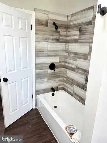 a bathroom with a bathtub